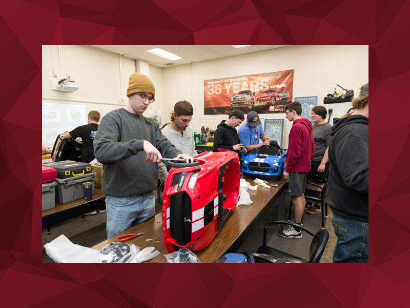 CCAC Automotive Technician Ford ASSET Program students begin assembling toy cars for charity