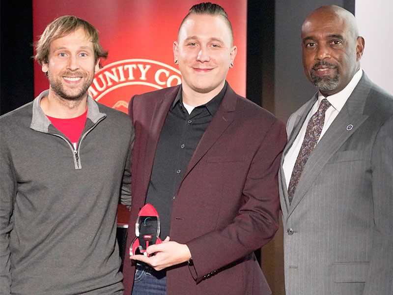 CCAC students Daniel Roth and Jason Gomes posed with Dr. Quintin Bullock following the presentation of their winning project at the Moonshot Museum in Nov. 2022.