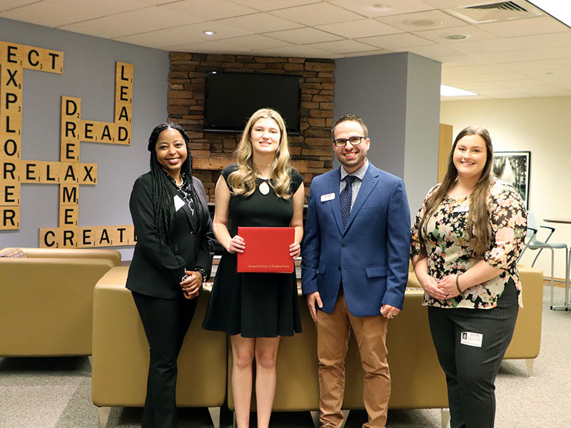 Pictured left to right: Dr. Tiffany Evans, CCAC Dean of Students and Interim Enrollment Services Lead Administrator; Madison Benedict, Baldwin High School student and first CCAC graduate of the BNY Mellon Early College High School Program; Johnny Marcolini, CCAC Early College Program Director; and Jessica Fetchko, CCAC Early College Program Coordinator.