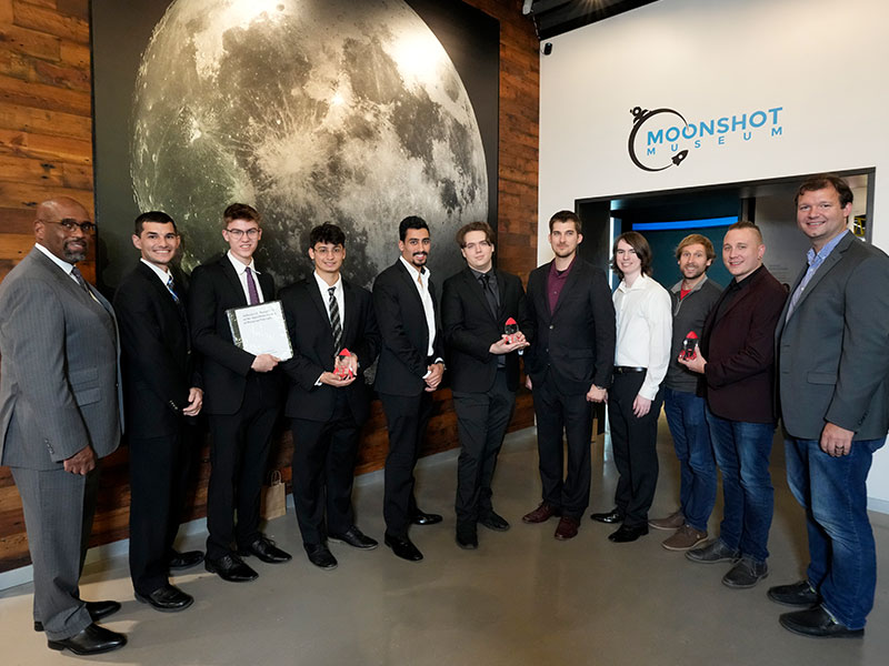 CCAC students from the three winning teams with Dr. Quintin Bullock, CCAC president, and Dr. Justin Starr, CCAC endowed professor of advanced technologies. Left to Right: Dr. Quintin Bullock, Jared Mott, Isaac Brennan, Yasseen Sabil, Basem Majed, Hunter Sasse, Patrick Terry, Cole Gilbert, Daniel Roth, Jason Gomes and Dr. Justin Starr.