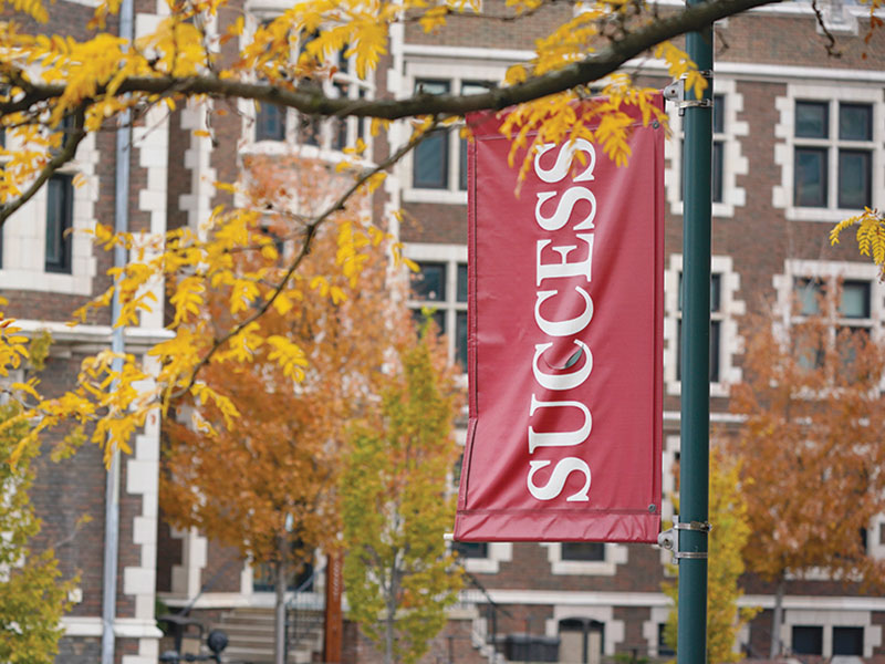 CCAC Success flag on a pole, at Allegheny Campus