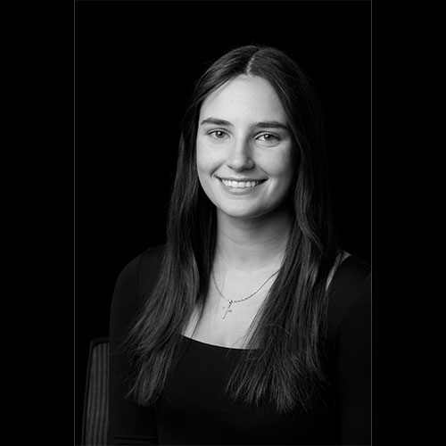 A black and white headshot of Kylie Rygelski