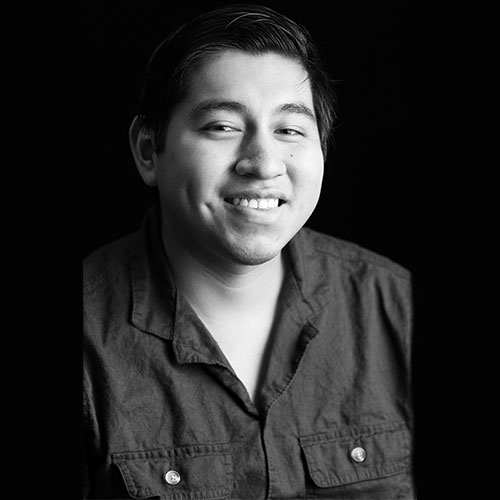 A black and white headshot of Jaquan Brookman